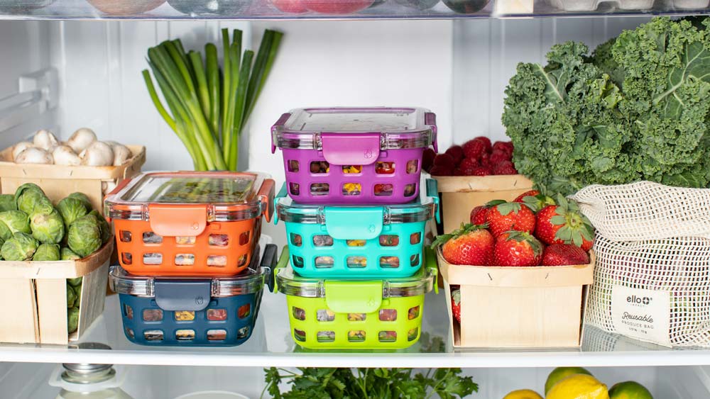 Interior of a fridge, full of fresh fruits and vegetables